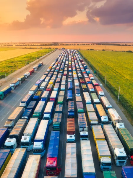 aerial-view-of-colorful-trucks-in-terminal-at-suns-2021-09-03-20-16-14-utc